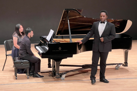 Singer and pianist performing