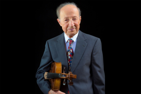 Jerzy Kosmala with string instrument