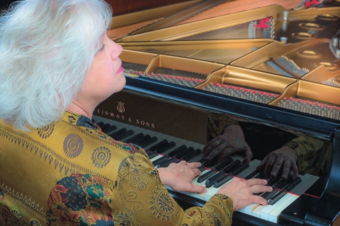 Lorna Griffitt playing the piano