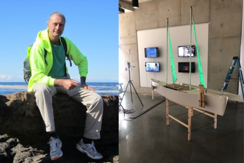 artist in green jacket and a boat with green sails